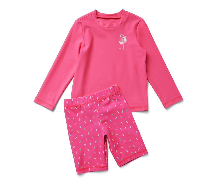 Pinke Kinder-Kombi mit UV-Schutzfaktor 80, bestehend aus Langarmshirt und Shorts.